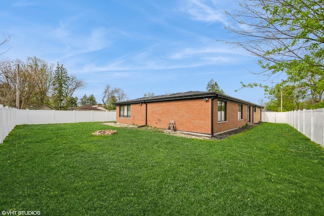 view of yard featuring a fenced backyard