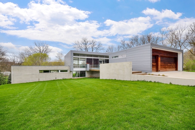 5N770 Pearson Dr, Wayne, IL 60184 - back of property with a lawn, concrete driveway, and stairway