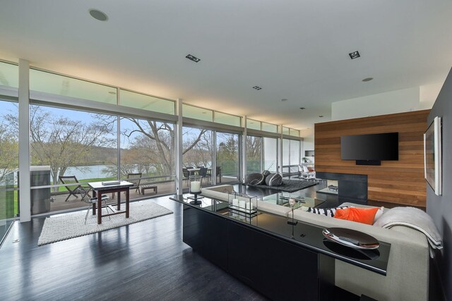 5N770 Pearson Dr, Wayne, IL 60184 - living room with expansive windows, wood finished floors, a water view, and wood walls