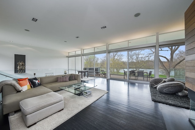 5N770 Pearson Dr, Wayne, IL 60184 - living area featuring floor to ceiling windows, wood finished floors, and a water view