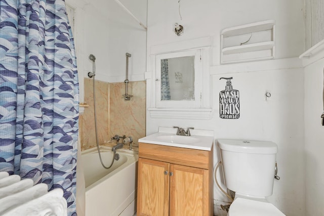 full bathroom with shower / tub combo, vanity, and toilet