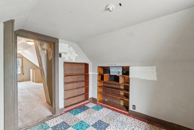bonus room with vaulted ceiling