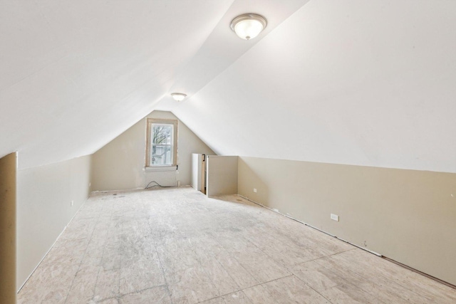 bonus room with vaulted ceiling
