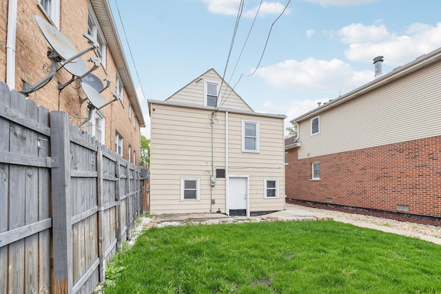 rear view of house with a patio