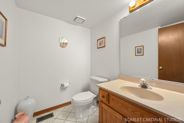 221 Ashley Ct, Oswego, IL 60543 - bathroom featuring tile patterned floors, toilet, vanity, and baseboards