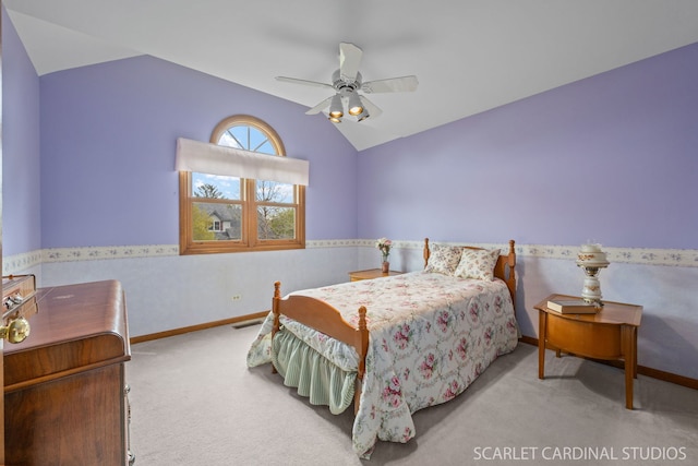 221 Ashley Ct, Oswego, IL 60543 - bedroom with vaulted ceiling, carpet flooring, baseboards, and a ceiling fan