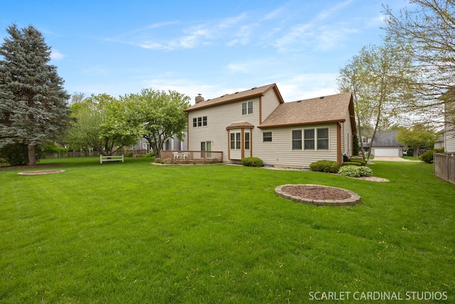 221 Ashley Ct, Oswego, IL 60543 - back of property with a chimney and a wooden deck