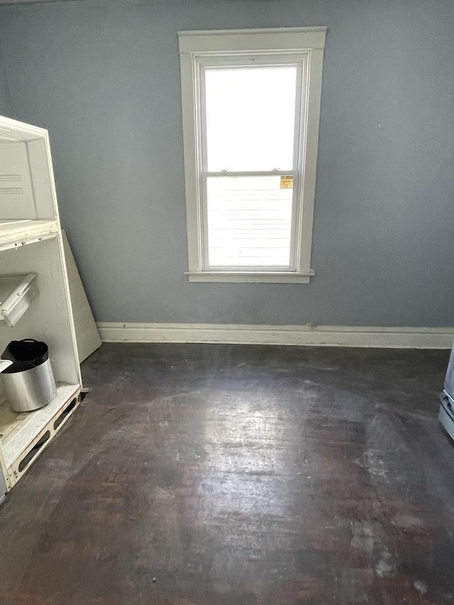 empty room with baseboards