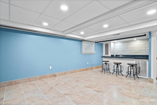 kitchen featuring recessed lighting, a breakfast bar area, and visible vents