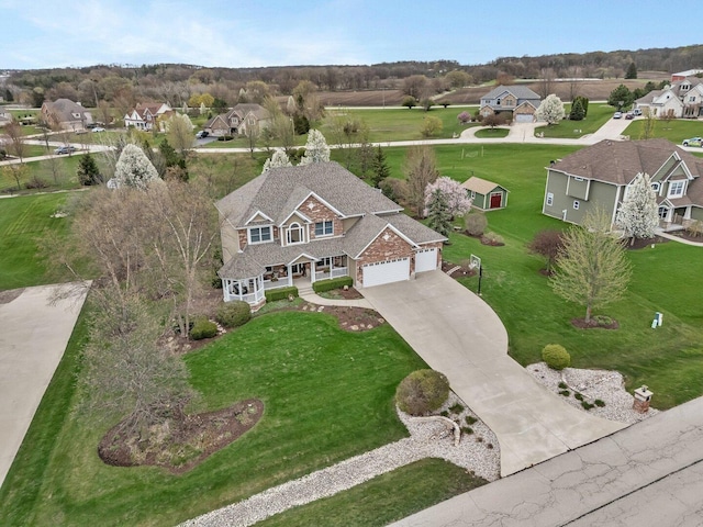 drone / aerial view with a residential view