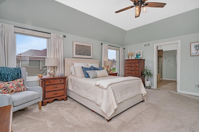 bedroom featuring a ceiling fan, visible vents, baseboards, light colored carpet, and lofted ceiling