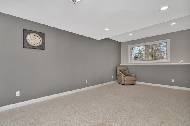 unfurnished room featuring carpet, recessed lighting, and baseboards