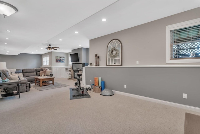 workout room featuring baseboards, recessed lighting, a ceiling fan, and carpet