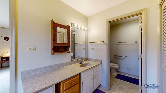 8400 Howe Rd, Wonder Lake, IL 60097 - bathroom featuring toilet, tile patterned flooring, and vanity