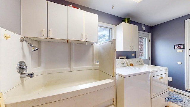 8400 Howe Rd, Wonder Lake, IL 60097 - washroom featuring separate washer and dryer and cabinet space