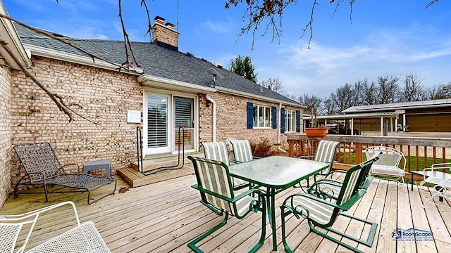 8400 Howe Rd, Wonder Lake, IL 60097 - wooden terrace with outdoor dining area
