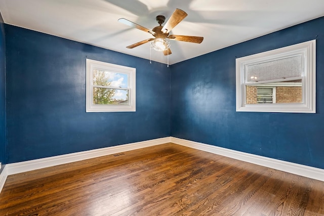 5932 107th Pl, Chicago Ridge, IL 60415 - unfurnished room with baseboards, ceiling fan, and wood finished floors