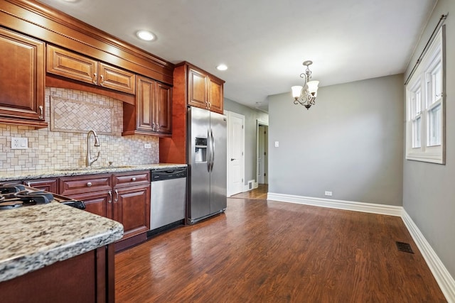 5932 107th Pl, Chicago Ridge, IL 60415 - kitchen featuring backsplash, appliances with stainless steel finishes, a sink, a notable chandelier, and dark wood-type flooring