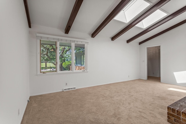 1204 Harrington Dr, Champaign, IL 61821 - unfurnished living room with carpet floors and a skylight