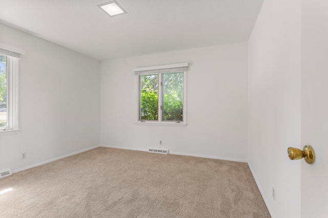 1204 Harrington Dr, Champaign, IL 61821 - carpeted spare room featuring plenty of natural light
