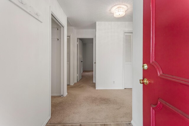 1204 Harrington Dr, Champaign, IL 61821 - hallway with carpet floors and baseboards