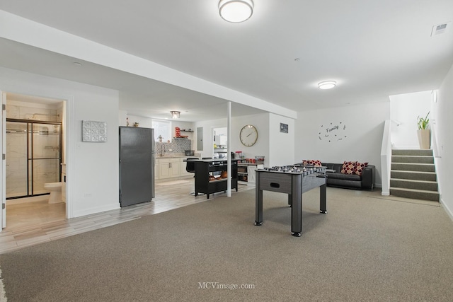 8566 S 83rd Ave, Hickory Hills, IL 60457 - game room featuring light colored carpet, baseboards, and visible vents