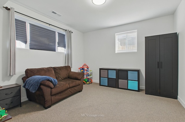 8566 S 83rd Ave, Hickory Hills, IL 60457 - carpeted living room featuring baseboards and visible vents