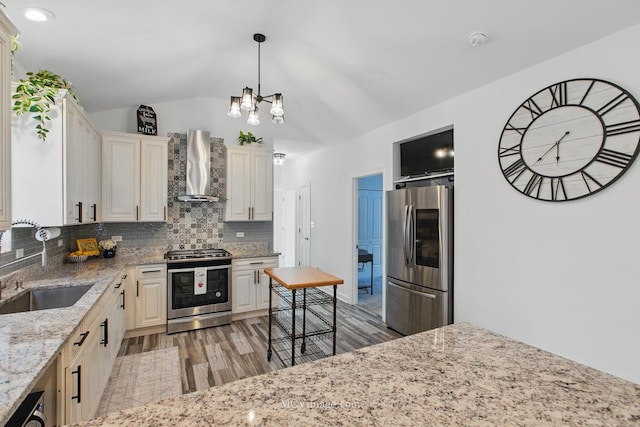 8566 S 83rd Ave, Hickory Hills, IL 60457 - kitchen with a sink, tasteful backsplash, appliances with stainless steel finishes, wall chimney exhaust hood, and light wood-style floors