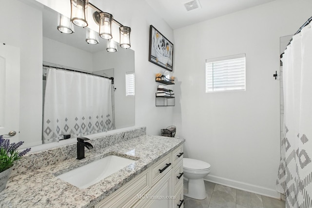 8566 S 83rd Ave, Hickory Hills, IL 60457 - bathroom with toilet, baseboards, vanity, and visible vents