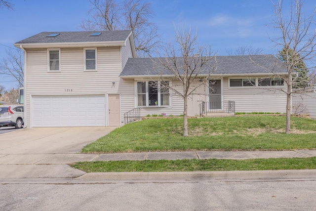 1315 Dellmar Ave, Joliet, IL 60435 - tri-level home with driveway, a shingled roof, a front lawn, and a garage