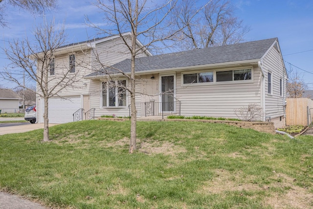 1315 Dellmar Ave, Joliet, IL 60435 - split level home featuring a garage, a front lawn, driveway, and a shingled roof