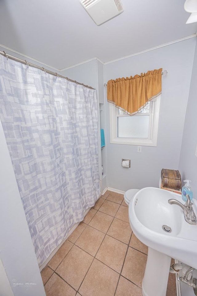 1315 Dellmar Ave, Joliet, IL 60435 - full bathroom featuring a sink, tile patterned floors, and a shower with shower curtain