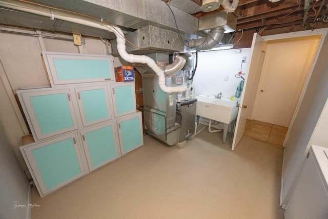 1315 Dellmar Ave, Joliet, IL 60435 - unfinished below grade area with heating unit and a sink
