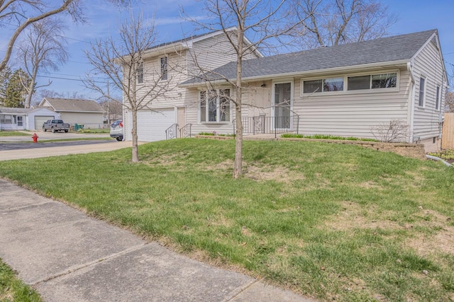1315 Dellmar Ave, Joliet, IL 60435 - tri-level home featuring concrete driveway, an attached garage, roof with shingles, and a front lawn