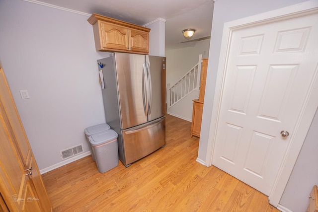 1315 Dellmar Ave, Joliet, IL 60435 - kitchen with freestanding refrigerator, baseboards, visible vents, and light wood-type flooring