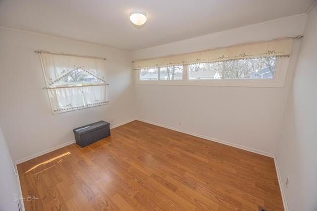 1315 Dellmar Ave, Joliet, IL 60435 - unfurnished room with baseboards and wood finished floors