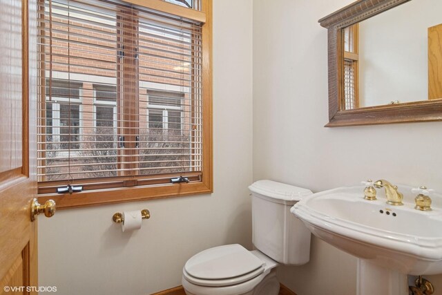 bathroom featuring a sink and toilet