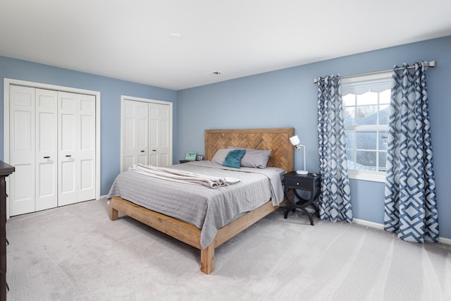 925 Appomattox Cir, Naperville, IL 60540 - bedroom featuring carpet floors, baseboards, and multiple closets