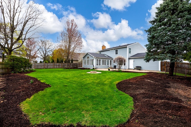 925 Appomattox Cir, Naperville, IL 60540 - view of yard with a fenced backyard, an outdoor fire pit, and a patio area