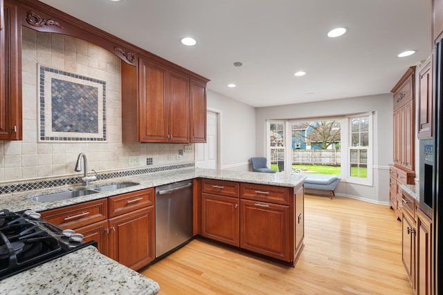 925 Appomattox Cir, Naperville, IL 60540 - kitchen featuring backsplash, dishwasher, a sink, light wood finished floors, and a peninsula