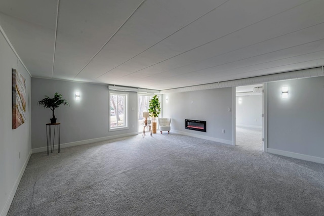 1022 Beau Brummel Dr, Sleepy Hollow, IL 60118 - unfurnished living room featuring a glass covered fireplace, carpet, and baseboards