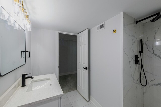 1022 Beau Brummel Dr, Sleepy Hollow, IL 60118 - full bathroom featuring a marble finish shower, vanity, baseboards, tile patterned flooring, and visible vents