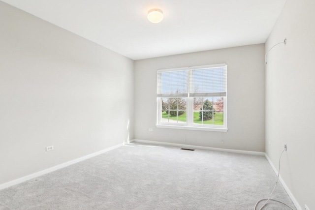 1461 S Candlestick Way, Waukegan, IL 60085 - carpeted spare room with visible vents and baseboards