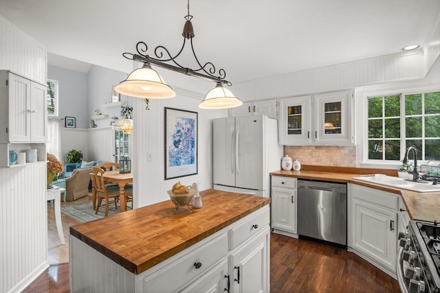 3 Spring Garden Ct, Lake In The Hills, IL 60156 - kitchen featuring butcher block counters, stainless steel appliances, a sink, dark wood finished floors, and white cabinets