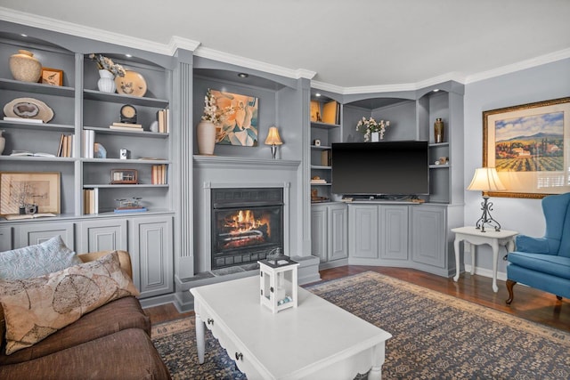 3 Spring Garden Ct, Lake In The Hills, IL 60156 - living area with crown molding, built in shelves, wood finished floors, and a glass covered fireplace