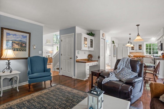 3 Spring Garden Ct, Lake In The Hills, IL 60156 - living room featuring dark wood finished floors, baseboards, and crown molding