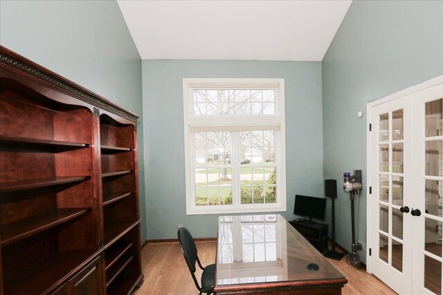 office featuring french doors and light wood-style floors