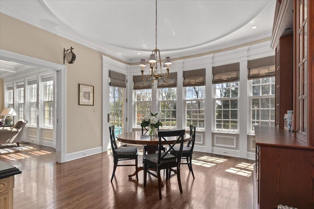 1300 Hackberry Ln, Winnetka, IL 60093 - dining space featuring a chandelier, ornamental molding, plenty of natural light, and dark wood-type flooring
