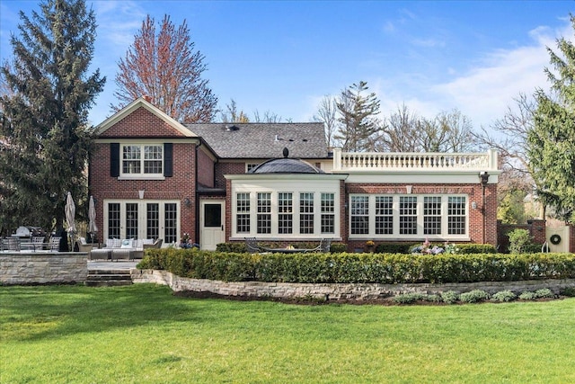 1300 Hackberry Ln, Winnetka, IL 60093 - back of property featuring a lawn, brick siding, and outdoor lounge area