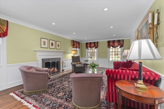 1300 Hackberry Ln, Winnetka, IL 60093 - living room with a premium fireplace, wainscoting, wood finished floors, crown molding, and recessed lighting